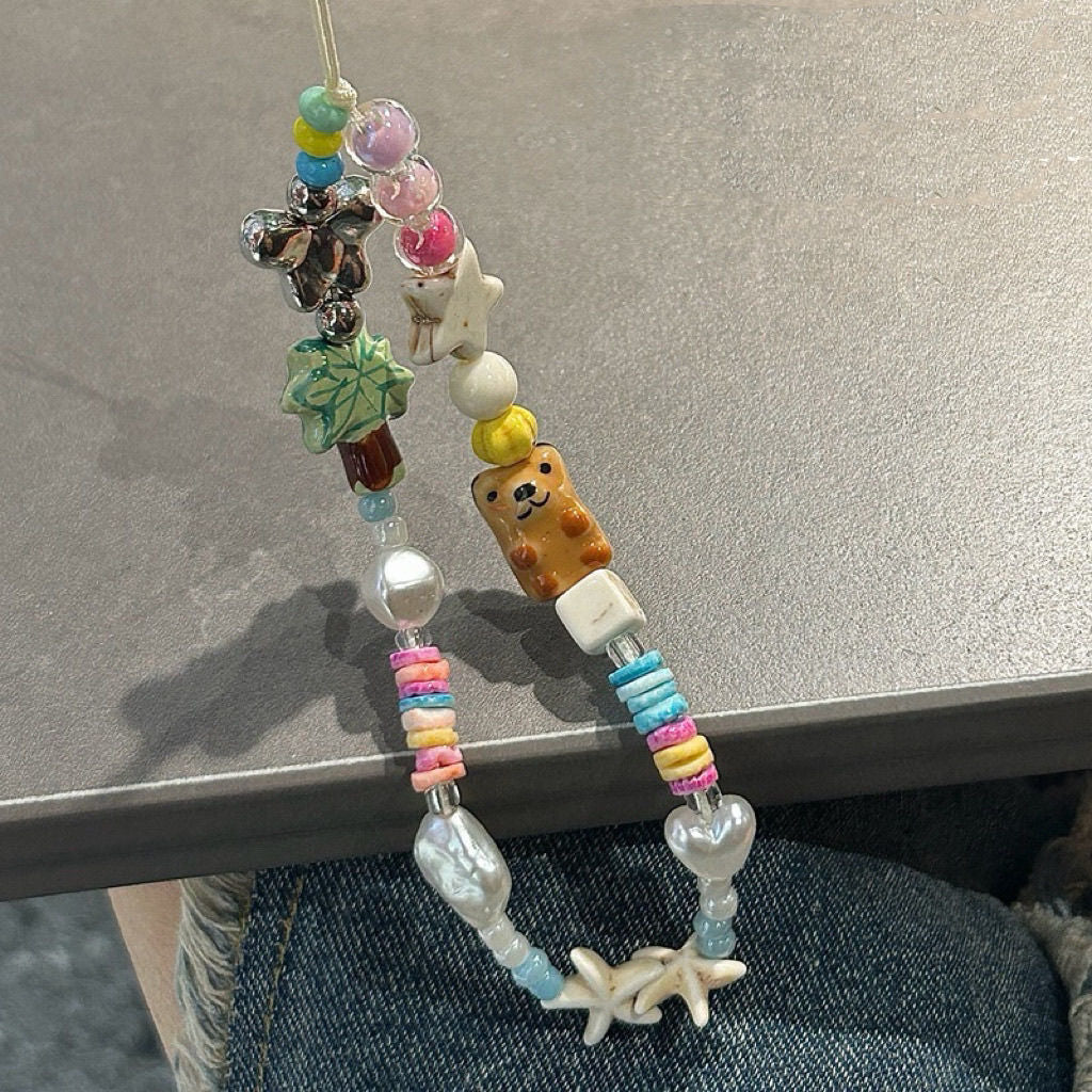 Collier de lunettes à perles et breloques