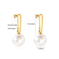 Boucles d'oreilles pendantes pour femme avec perle et finition dorée