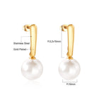 Boucles d'oreilles pendantes pour femme avec perle et finition dorée