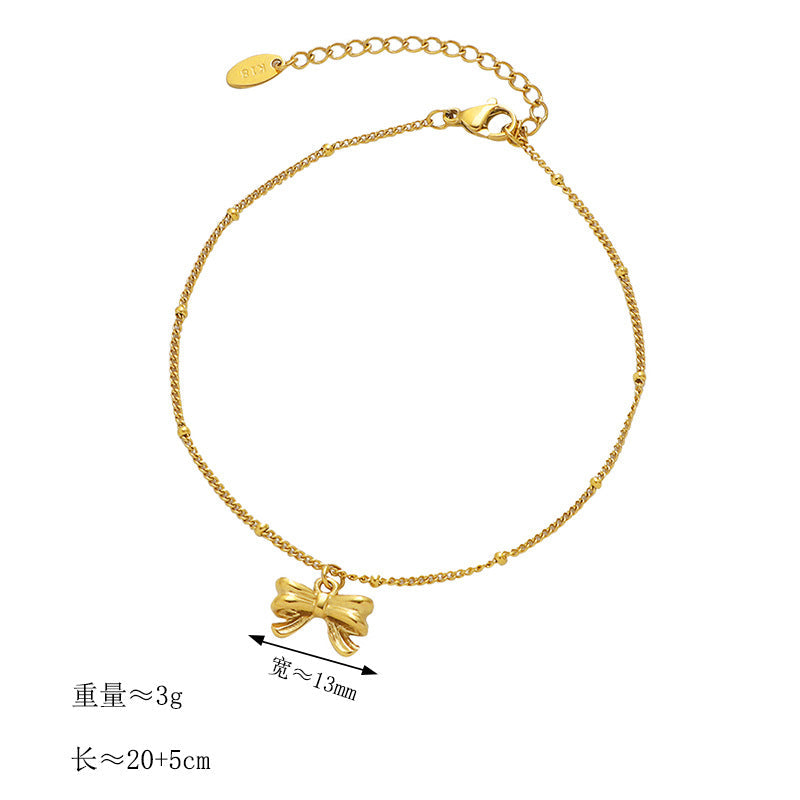 Chaîne de cheville pour femme avec pendentif nœud élégant
