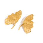 Boucles d'oreilles pendantes pour femme en forme de feuille