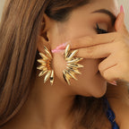 Boucles d'oreilles pendantes pour femme motif feuille