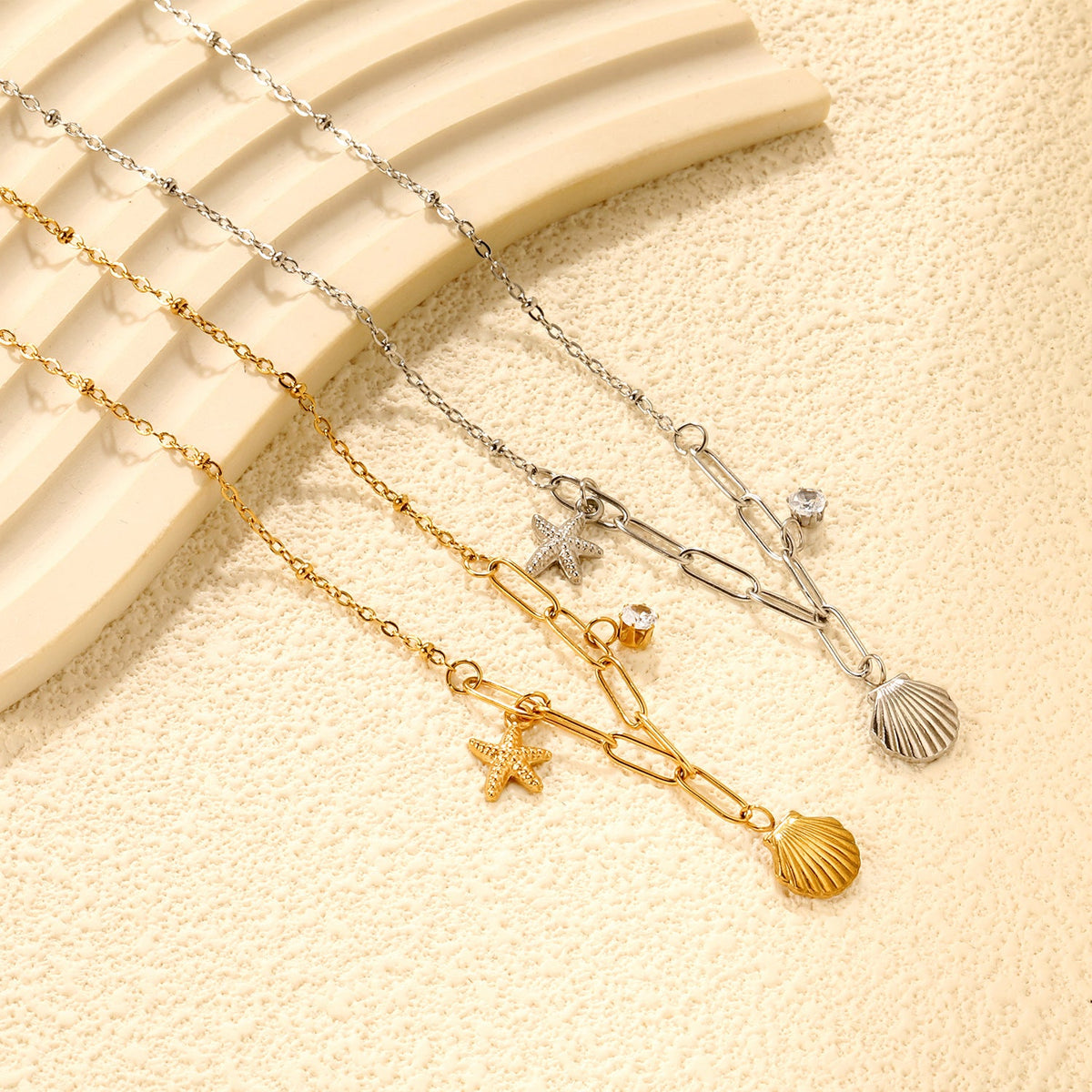 Collier pour femme avec pendentifs coquillage et étoile