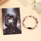 Bracelet pour femme en quartz rose avec accents noirs et dorés
