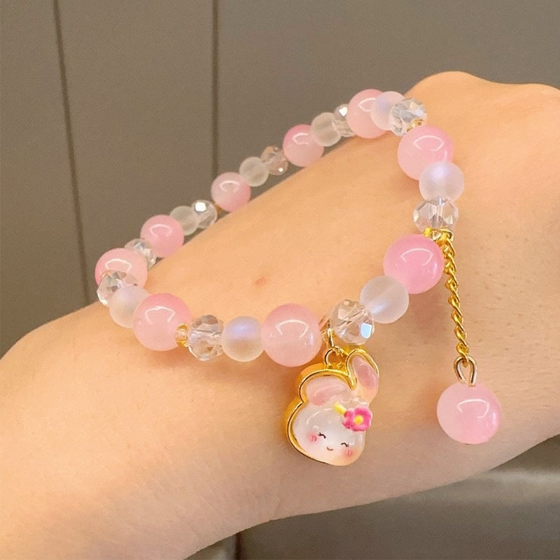 Bracelet fantaisie avec perles en verre colorées et pendentif