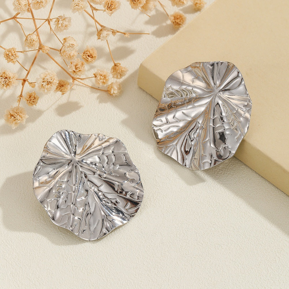 Boucles d'oreilles créateur pour femme en forme de feuille
