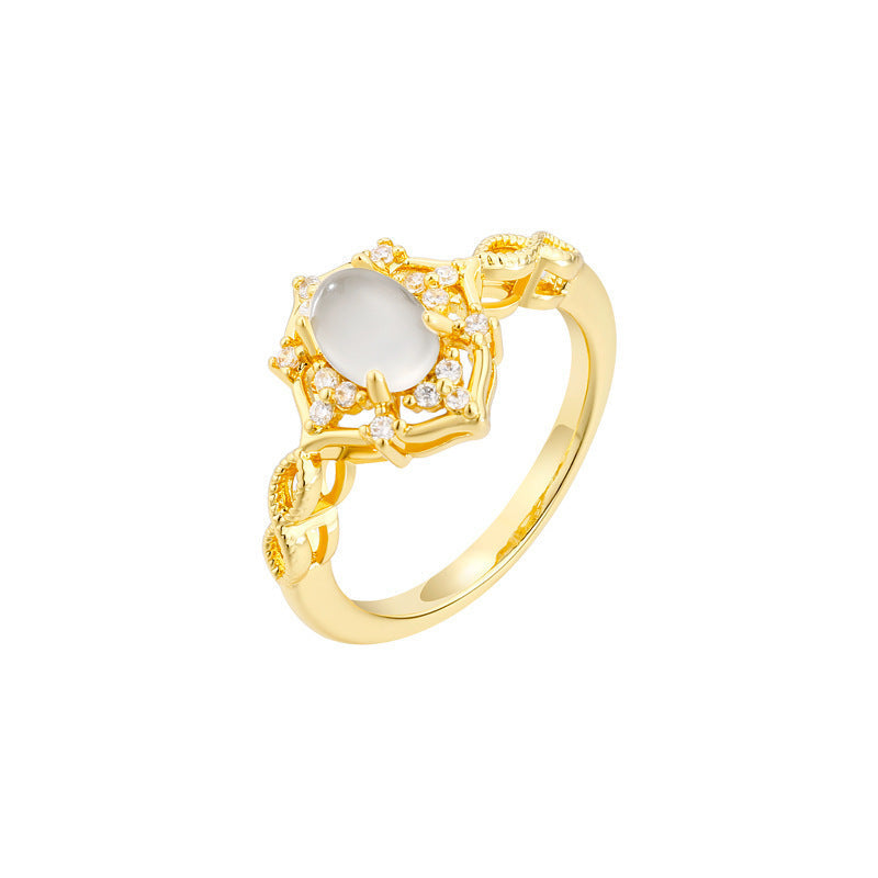 Bague élégante pour femme avec pierre ovale et monture travaillée