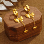 Boucles d'oreilles pendantes papillon et cœur