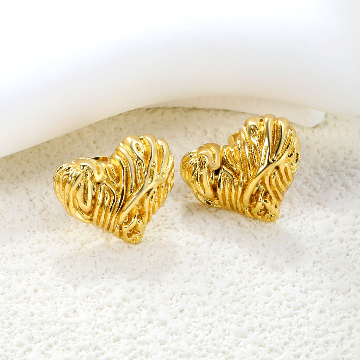 Clous d'oreilles pour femme motif cœur en acier inoxydable