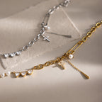 Collier pour femme avec pendentifs étoile et cœur en acier inoxydable