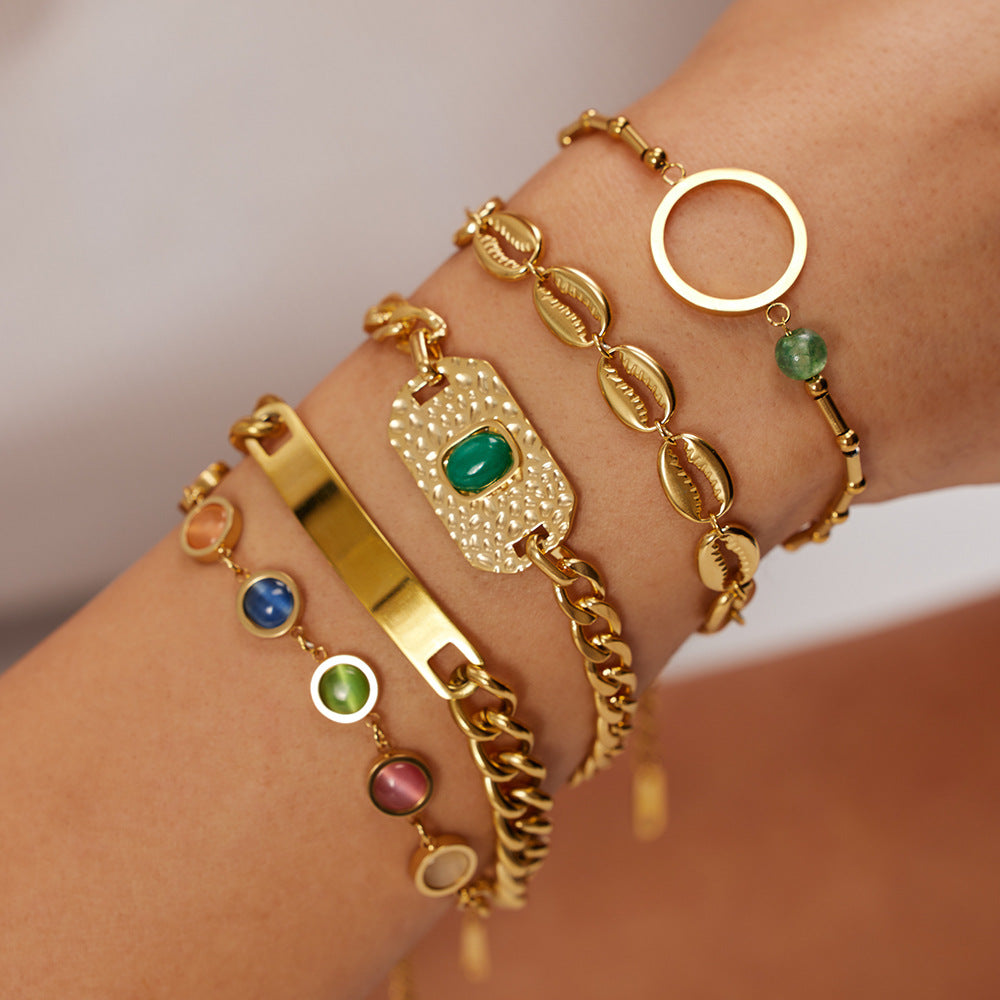 Bracelet pour femme avec motif coquillage en acier inoxydable