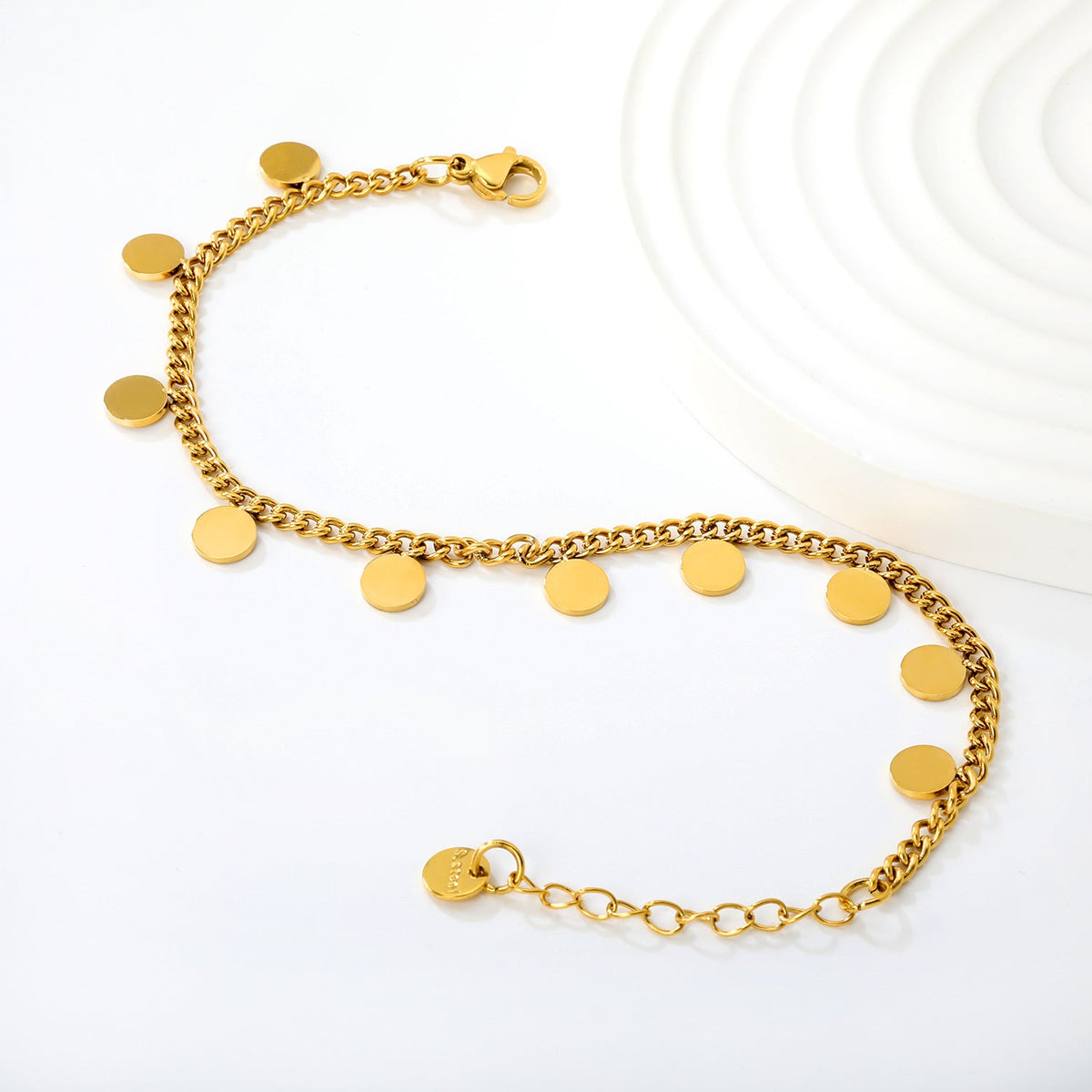 Bracelet élégant pour femme avec pendentifs ronds en acier inoxydable