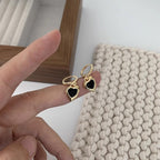 Boucles d'oreilles pendantes pour femme avec cœur et pierre noire