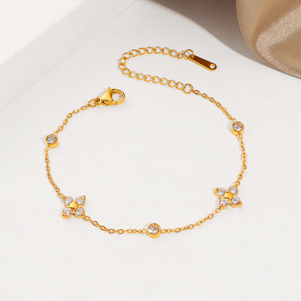 Bracelet délicat à breloques florales pour femme