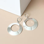 Boucles d'oreilles pendantes pour femme au design géométrique