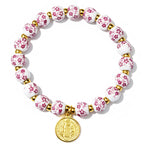 Bracelet pour femme au design floral avec accents dorés