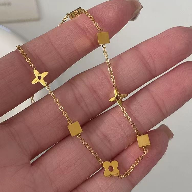 Bracelet chaîne à breloques plaqué or pour femme