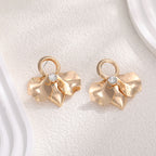 Boucles d'oreilles élégantes pour femme motifs floraux