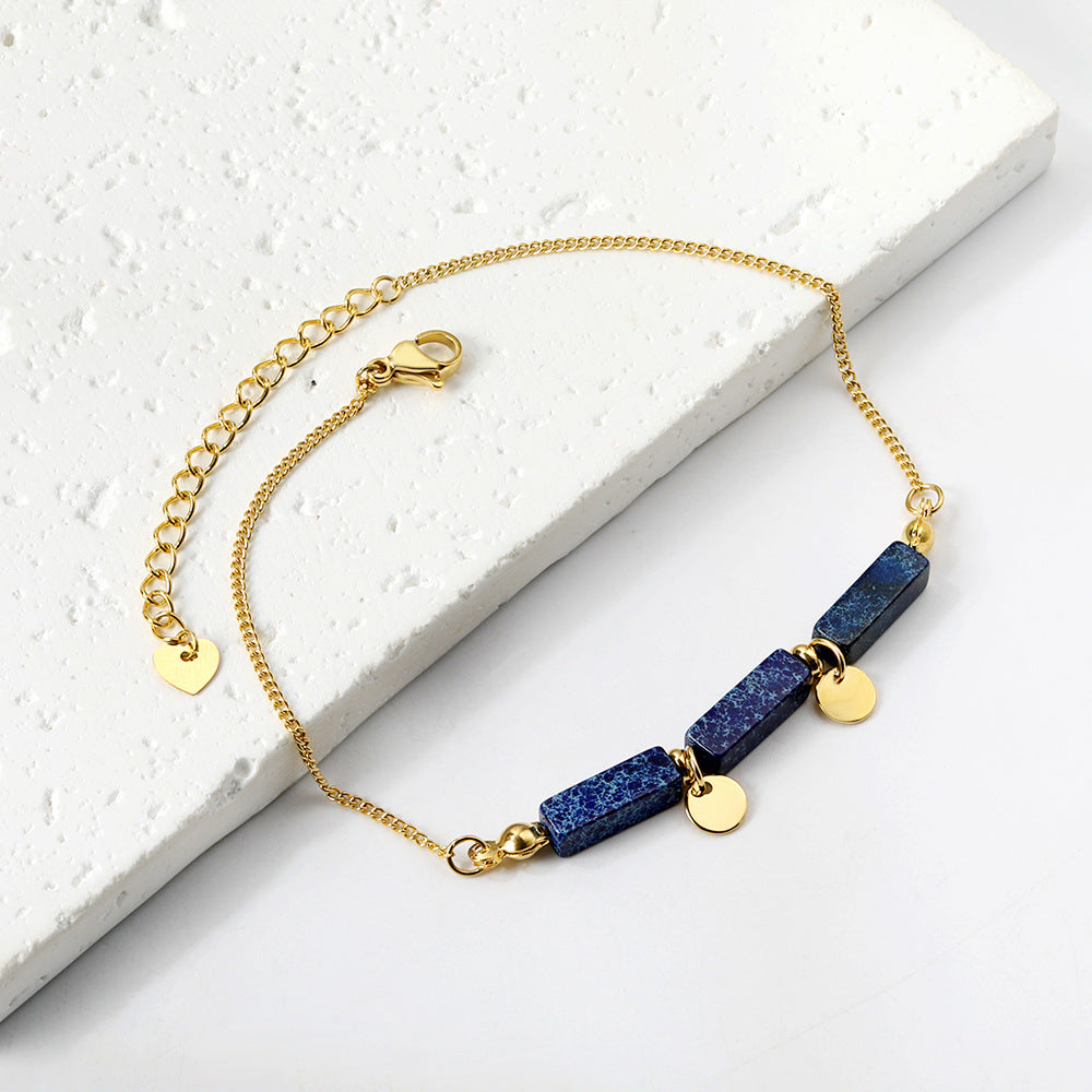 Bracelet pour femme avec éléments en pierre des Caraïbes et détails dorés