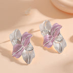 Clips d'oreilles pour femme au design élégant d'orchidée