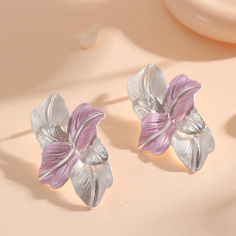 Clips d'oreilles pour femme au design élégant d'orchidée