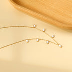 Collier élégant pour femme avec perles et chaîne fine