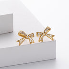 Boucles d'oreilles nœud en argent sterling 925 avec zircone