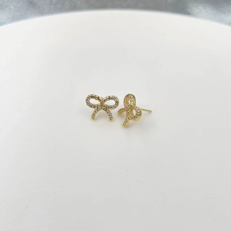 Boucles d'oreilles nœud pour femme avec cristaux étincelants