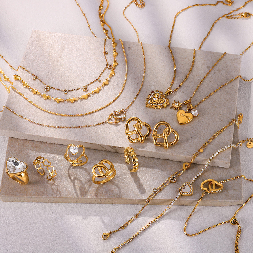 Bracelet pour femme avec fermoir réglable et pendentif en forme de cœur
