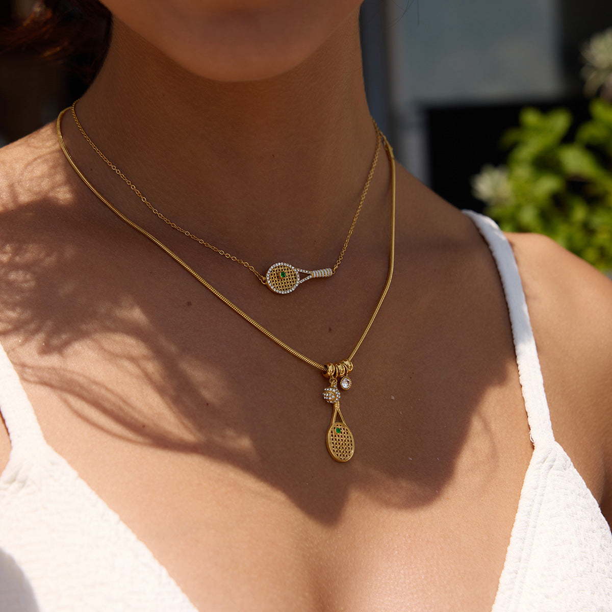 Collier pour femme avec pendentif raquette de tennis en acier inoxydable