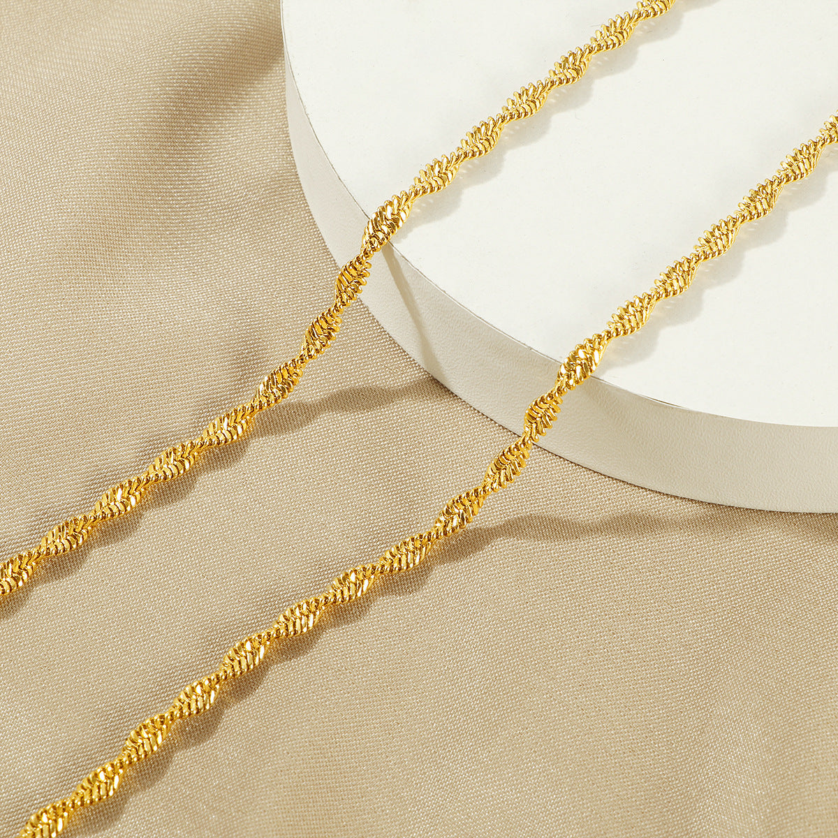 Collier chaîne torsadée dorée pour femme