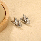Boucles d'oreilles pendantes pour femme avec double cœur en acier inoxydable