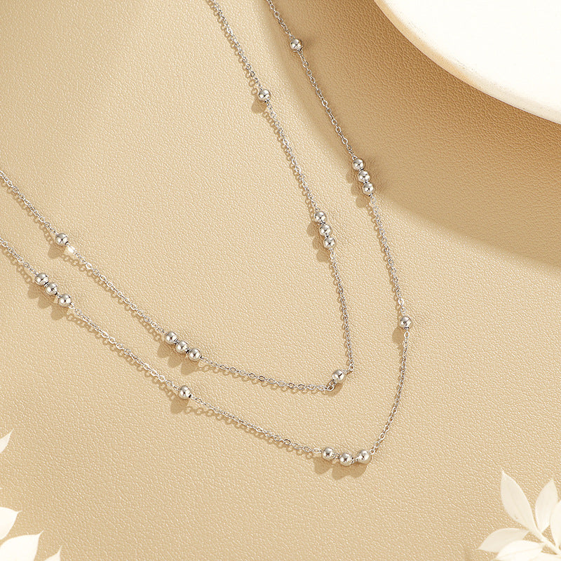 Collier pour femme avec détails de perles délicates