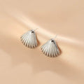 Boucles d'oreilles pendantes sculpturales inspirées des coquillages pour femme