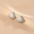 Boucles d'oreilles pendantes sculpturales inspirées des coquillages pour femme