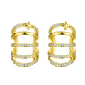 Boucles d'oreilles pendantes pour femme avec design spirale et zircone
