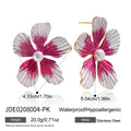 Boucles d'oreilles pendantes fleurs en acier inoxydable