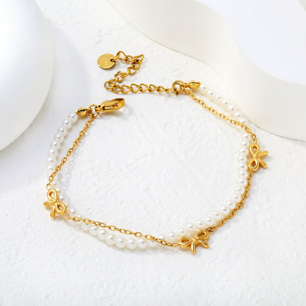 Bracelet pour femme avec pendentif cœur et design perlé luxueux