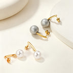 Boucles d'oreilles pendantes pour femme avec perle et finition dorée