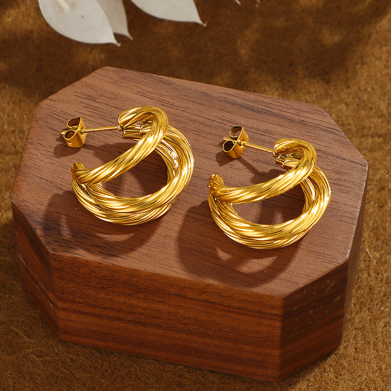 Boucles d'oreilles élégantes pour femme au design incurvé