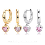 Boucles d'oreilles pendantes cœur avec finition dorée