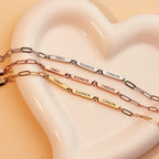 Bracelet trombone personnalisé avec noms de famille