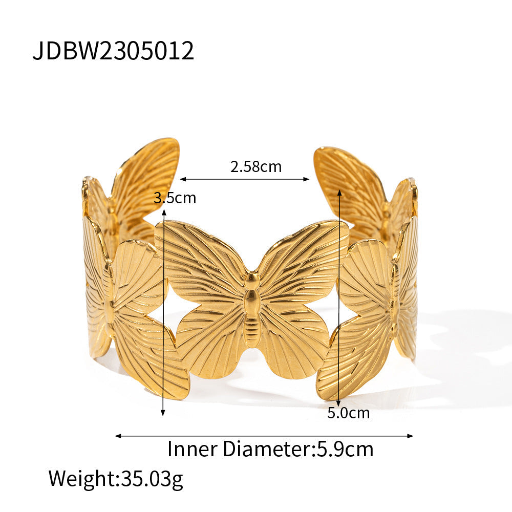 Bracelet rigide filigrane pour femme avec motif papillon