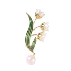 Broche fleur élégante avec pendentif perle