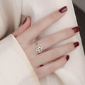 Bague ouverte double cœur pour femme en argent