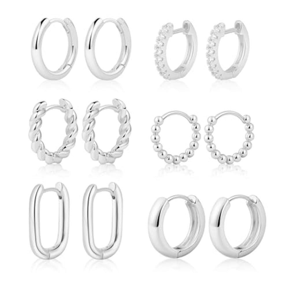 Boucles d'oreilles pendantes dorées pour femme au design goutte moderne