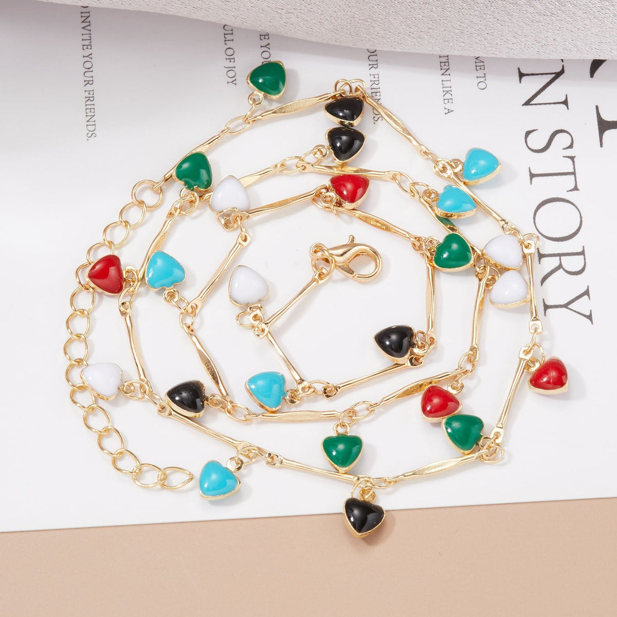 Collier statement à breloques cœur