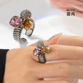 Bague pour femme avec cristaux colorés et design en spirale