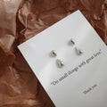 Boucles d'oreilles pendantes élégantes