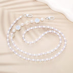 Collier élégant perles et chaîne